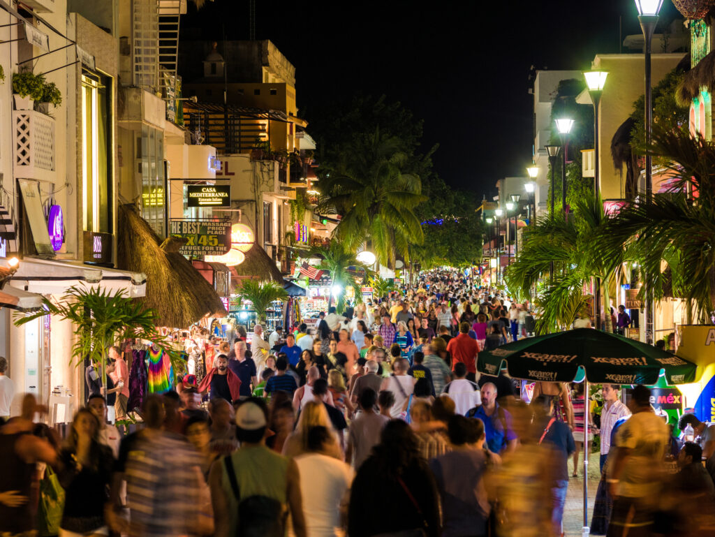 5th Ave in Playa del Carmen at night, full of tourists