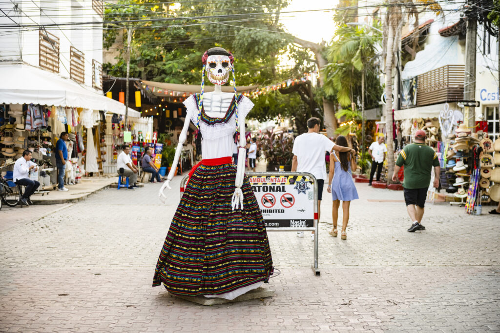 lady in costume with skull face for dia de los muertos playa del carmen