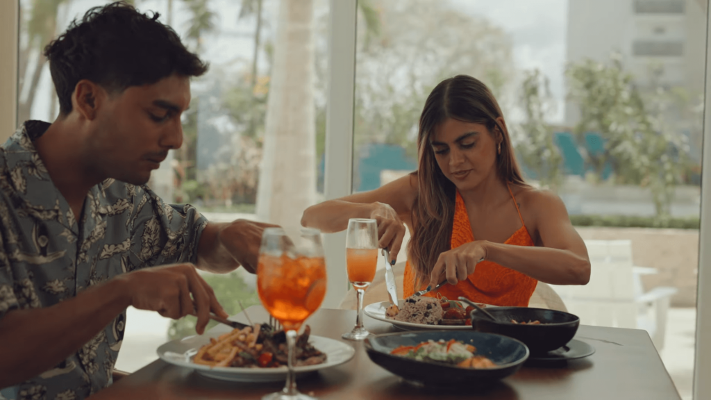 A couple enjoying a meal at the new restaurant in Surfside Hotel, Playa Caracol, Panama.