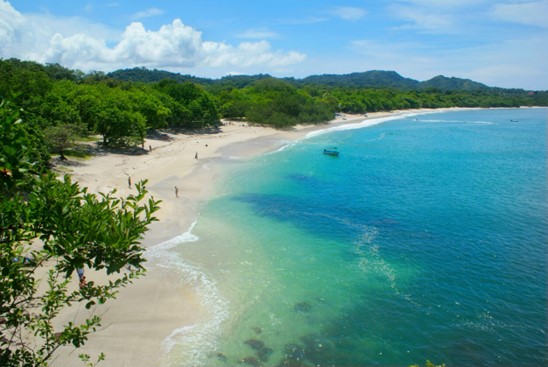 stunning beach with blue seas and white sand in Guanacaste, Costa Rica