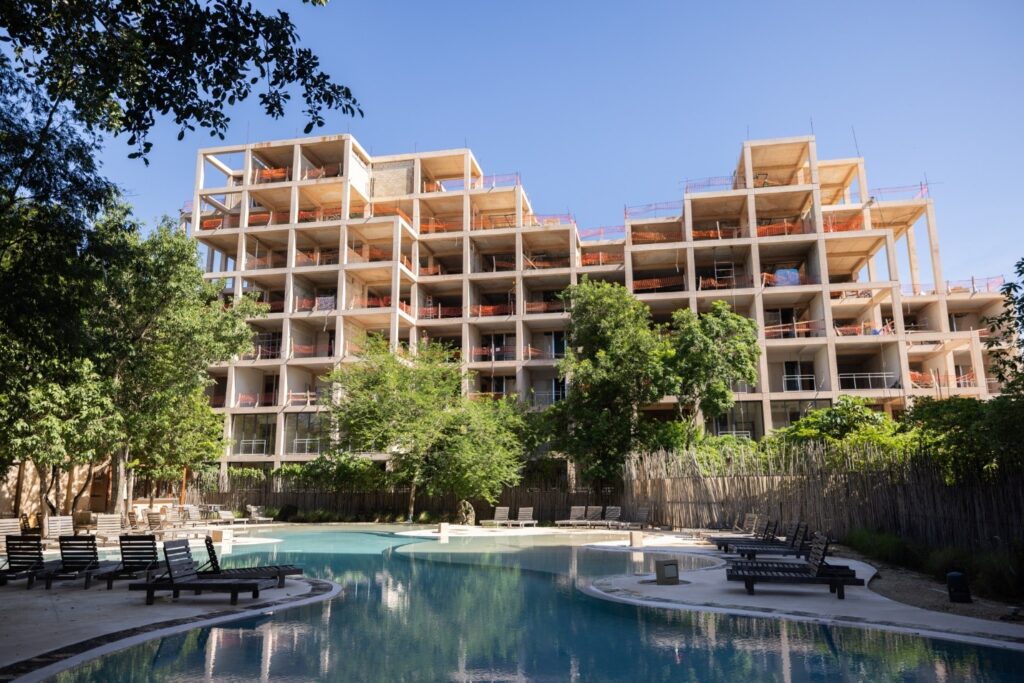 Image of swimming pool in front of one of the towers in The Village, Corasol