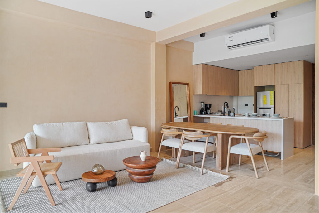 view of kitchen and sofa in tower 3 of The Village, Corasol.